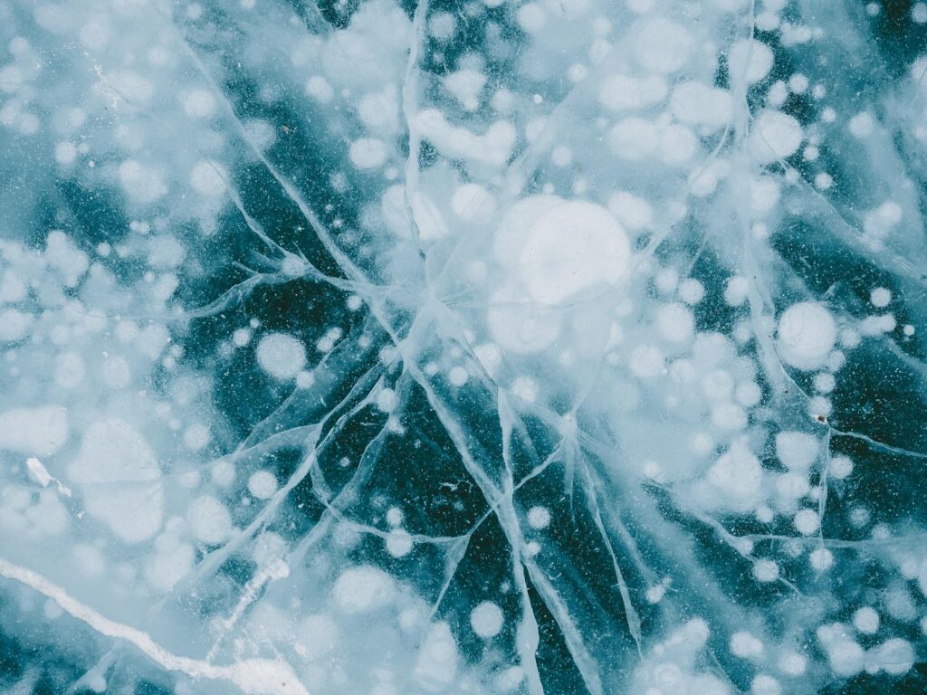 Complex fractal patterns expanding, symbolizing the growth and potential of decentralized AI models in various industries.