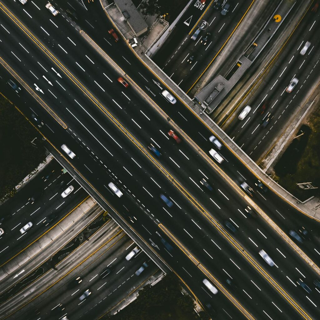 Futuristic depiction of smooth traffic flow facilitated by decentralized autonomous vehicles.