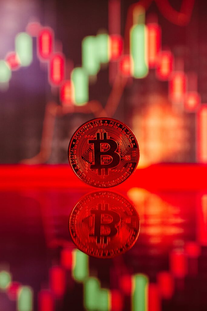 A close-up of a dramatic cryptocurrency candlestick chart showing a massive price drop.