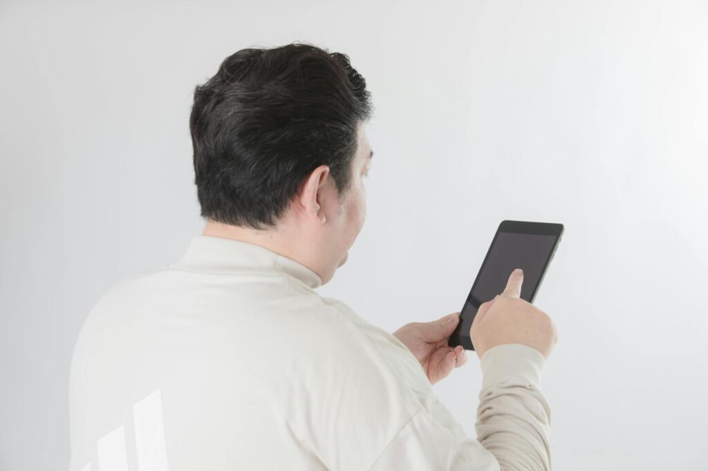 A clean and intuitive mobile application interface being used on a modern tablet, symbolizing a great user experience.