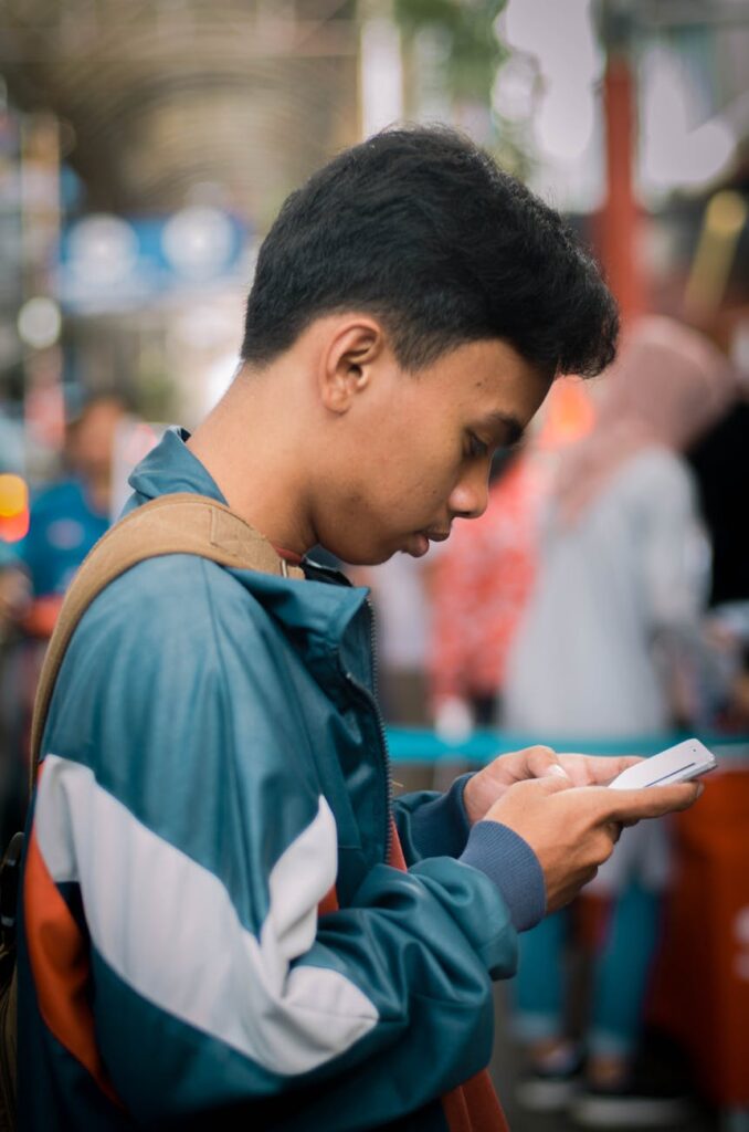A user interacting with a modern smart contract wallet on their mobile phone.