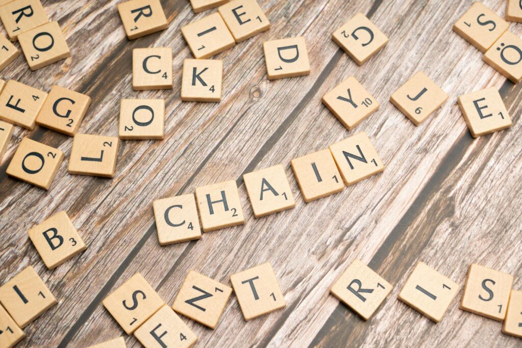 An abstract digital visualization of a decentralized blockchain network with glowing nodes and connecting lines.