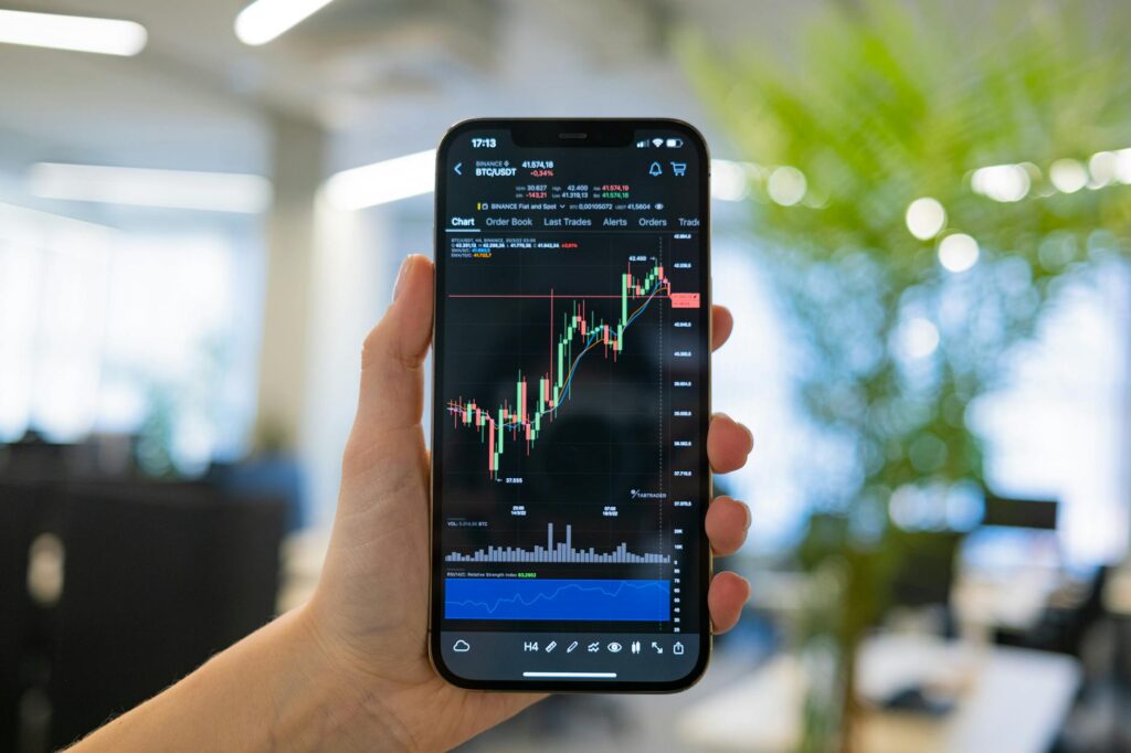 A digital screen displaying a long-term upward trend of a cryptocurrency graph, symbolizing patient investing.