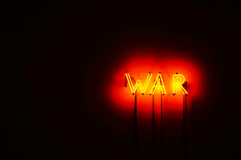 An abstract, glowing digital representation of the Bitcoin logo against a dark, futuristic background.