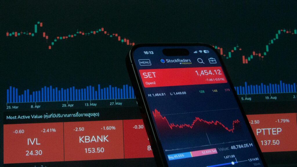 A complex cryptocurrency price chart on a digital screen displaying a dramatic and volatile red downturn.