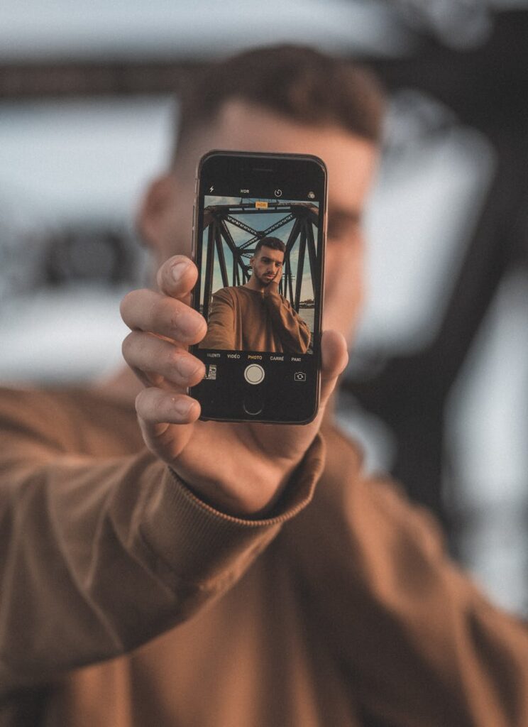 A close-up shot of a person's hand holding a smartphone displaying a secure cryptocurrency wallet interface.