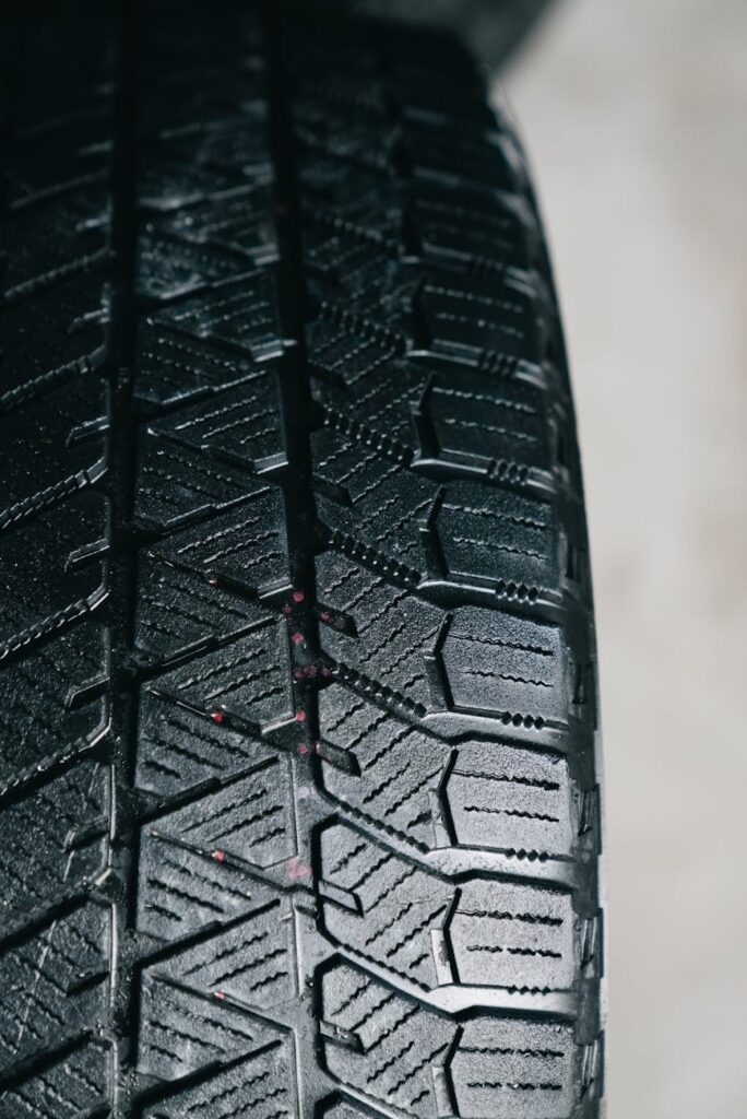 A close-up of a physical Monero coin on a dark surface, highlighting its role as digital cash.