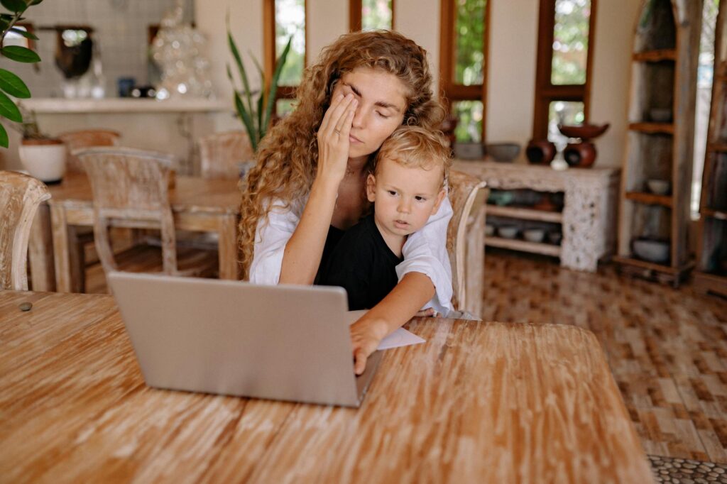 A focused analyst studying complex cryptocurrency price charts on a modern laptop screen.