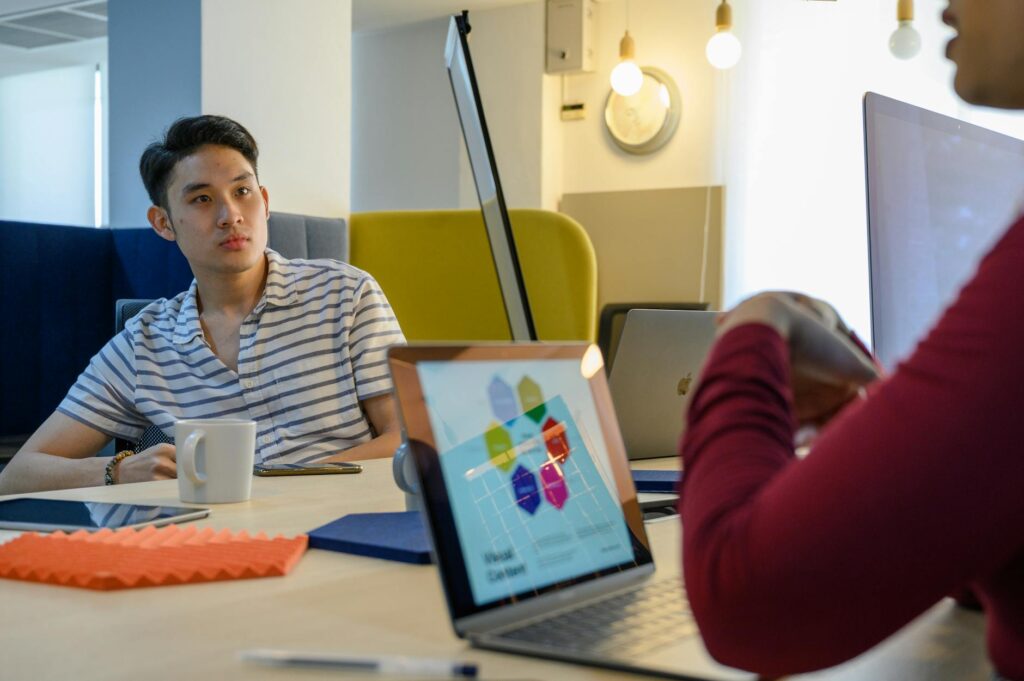 An investor analyzing a bullish cryptocurrency price chart on a dark screen.