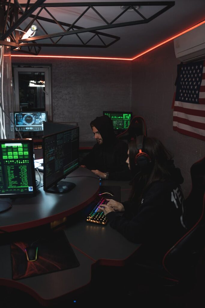 A trader focused on multiple computer screens showing complex cryptocurrency market data.