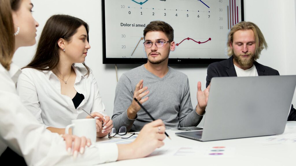 A diverse team of professionals collaborating in a modern office, analyzing cryptocurrency market data on a large screen.