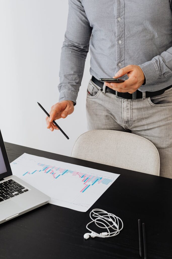 A digital padlock icon glowing over a fluctuating cryptocurrency candlestick chart, symbolizing digital asset security.