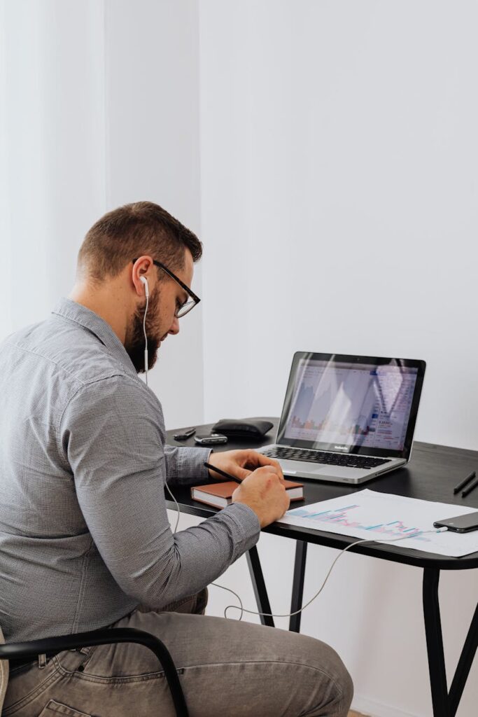 A financial analyst studying a detailed cryptocurrency price chart with complex data visualizations.