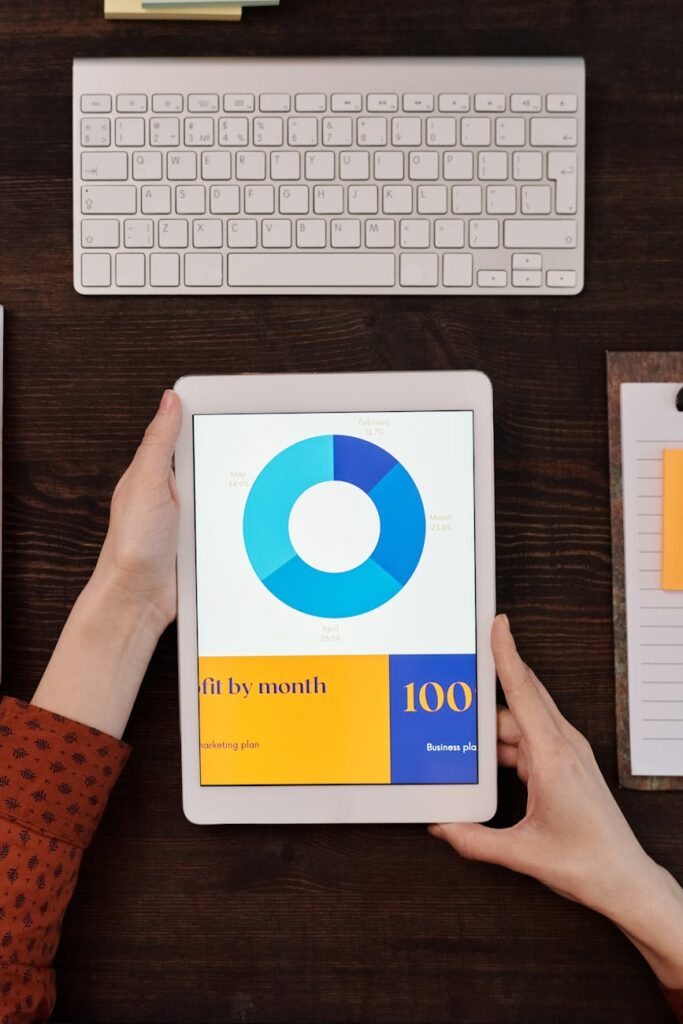 A trader analyzing crypto charts on multiple devices, highlighting the accessibility of decentralized exchanges.