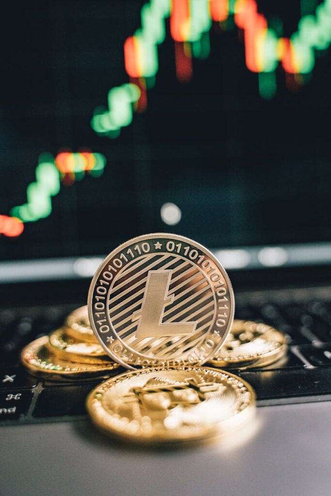 A judge's gavel resting next to a stack of physical Bitcoin and Ethereum coins, illustrating the theme of cryptocurrency regulation.