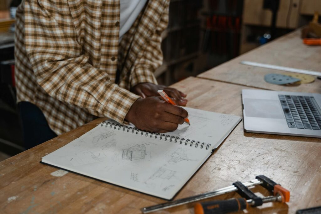 A focused trader analyzing a complex cryptocurrency price chart on their laptop screen.