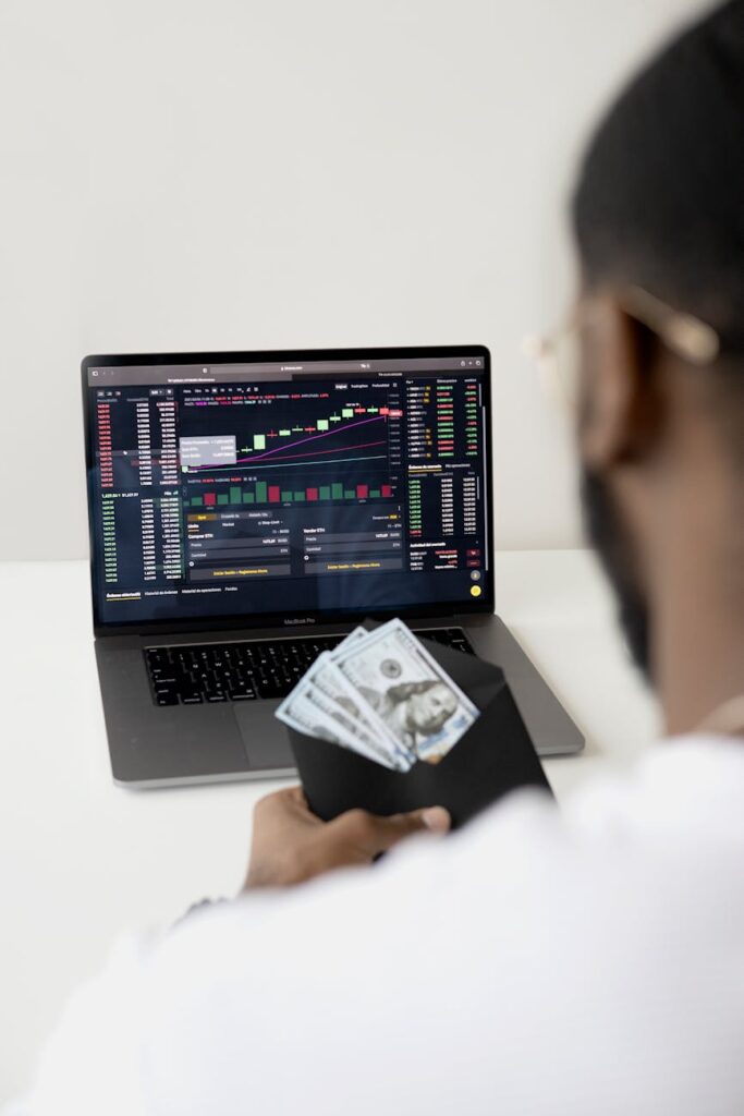 An investor intensely studying complex charts and data on a multi-monitor setup, illustrating due diligence.
