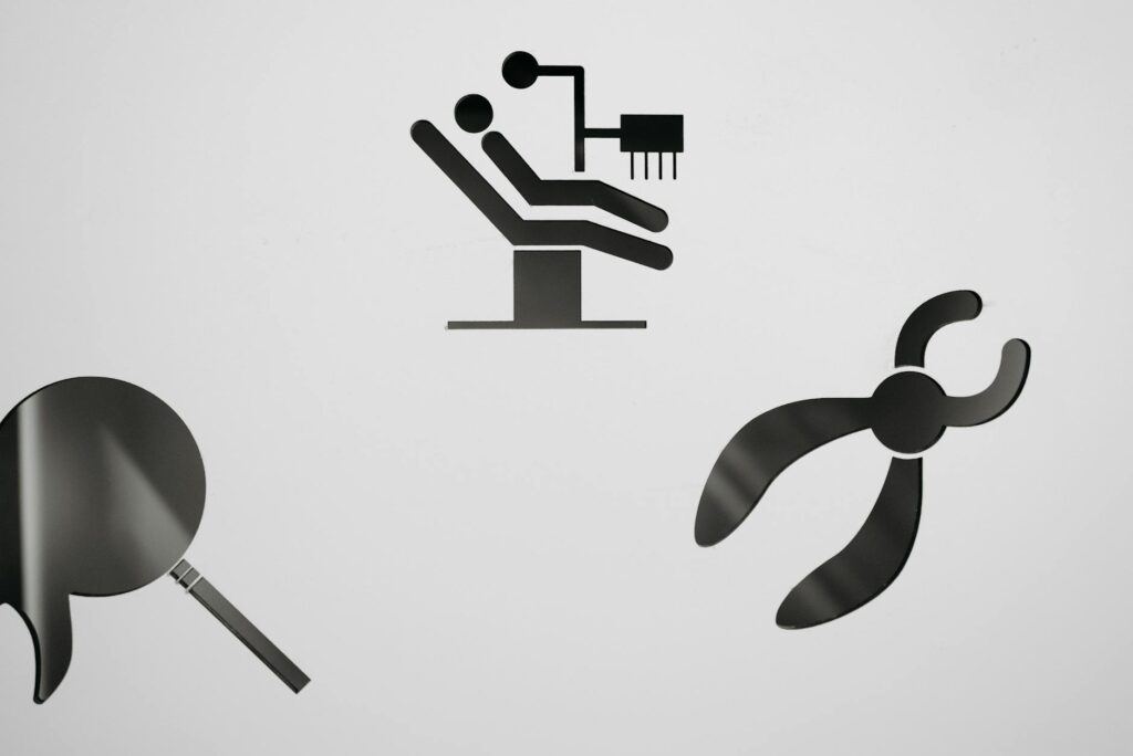 A close-up shot of physical Bitcoin, Ethereum, and Litecoin coins resting on a green computer motherboard.