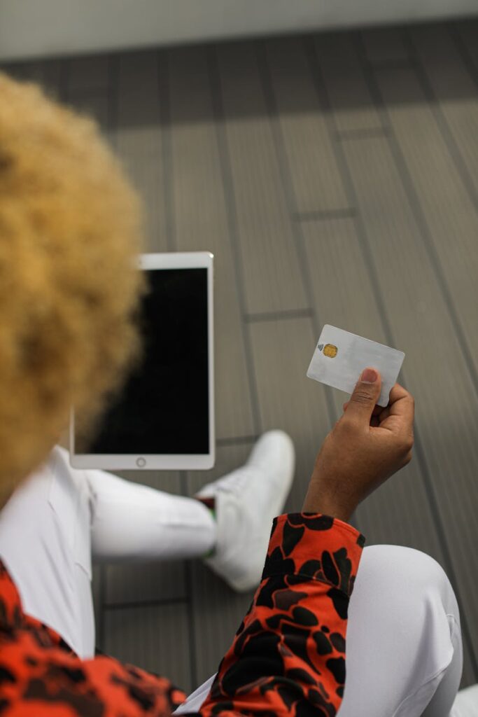 A close-up of a voter's hand touching a 'Cast Vote' button on a modern tablet screen.