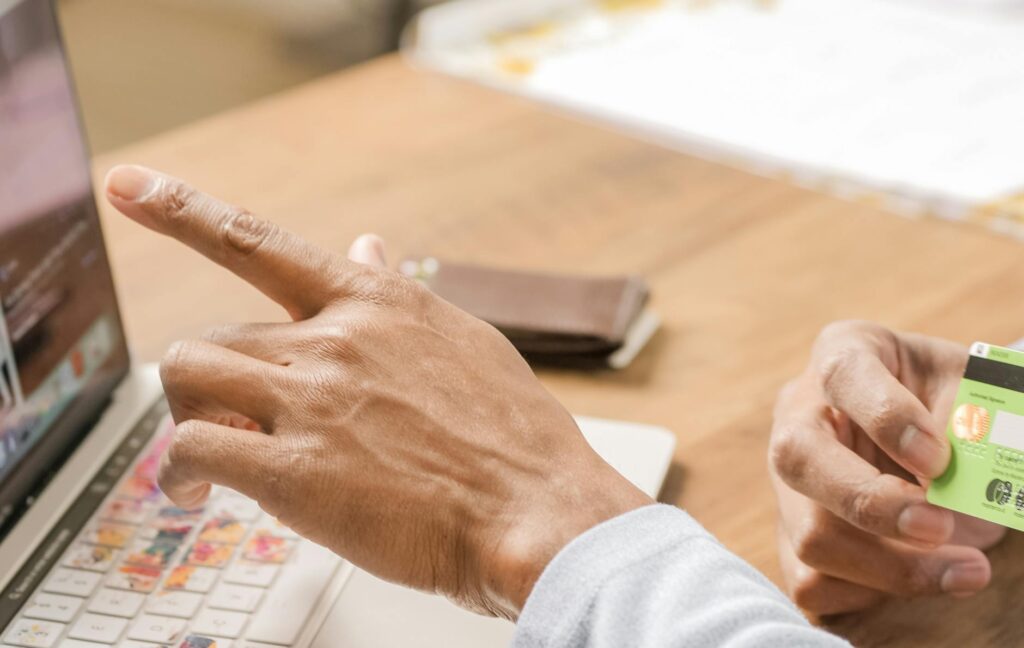 A close-up of a hardware crypto wallet connected to a computer, symbolizing digital asset security.
