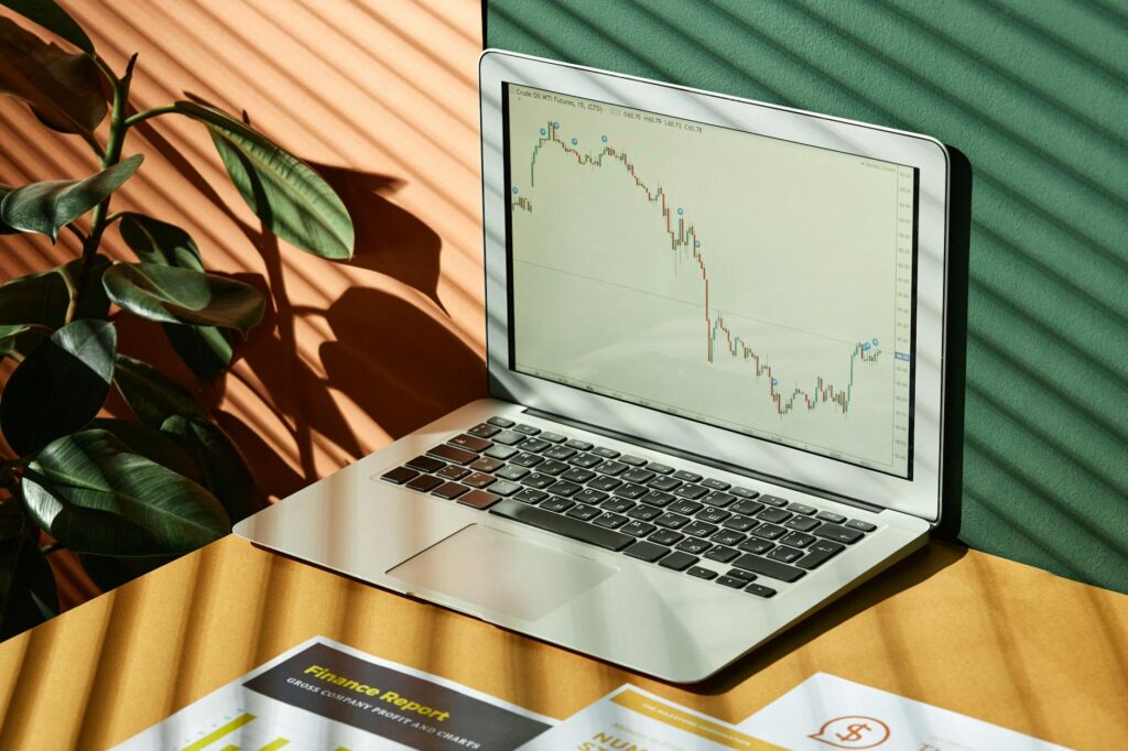 A detailed close-up of a Japanese candlestick chart for cryptocurrency trading on a bright monitor.