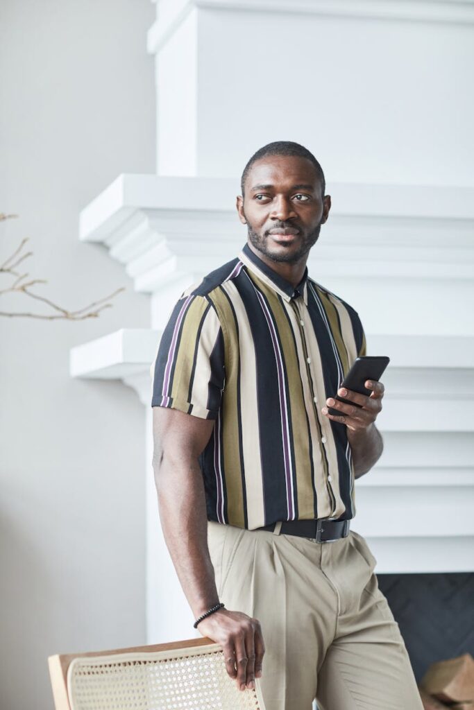 A person holding a smartphone with a cryptocurrency wallet app open, ready to make a payment.