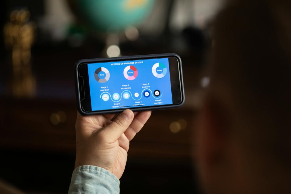 A concerned investor analyzes complex cryptocurrency graphs on a computer, illustrating the uncertainty of digital asset classification.