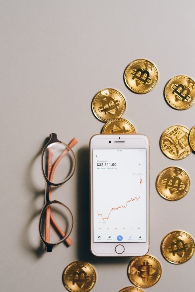 A close-up of a computer screen displaying a candlestick chart comparing Bitcoin's performance against the S&P 500.