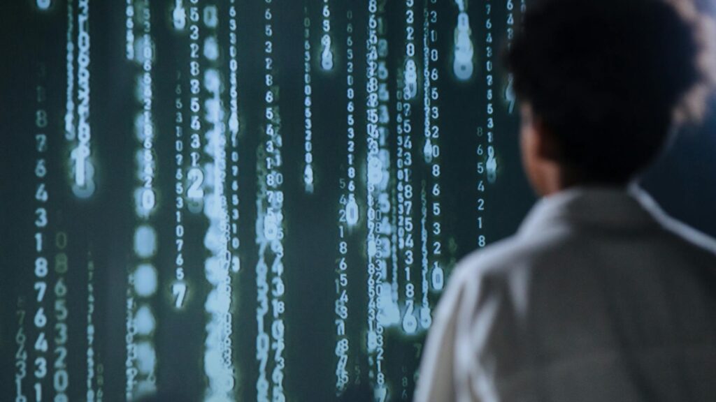 A modern data center with rows of servers, symbolizing the centralized cloud infrastructure being challenged by DePIN.