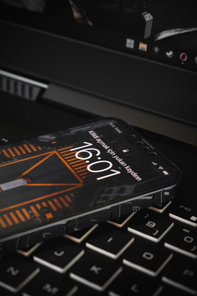 Detailed view of Solidity smart contract code on a dark-themed monitor, representing the legal implications of code.