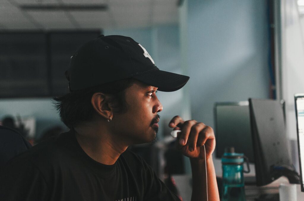 A data center server rack with blue light trails indicating data flow, symbolizing the data availability layer.