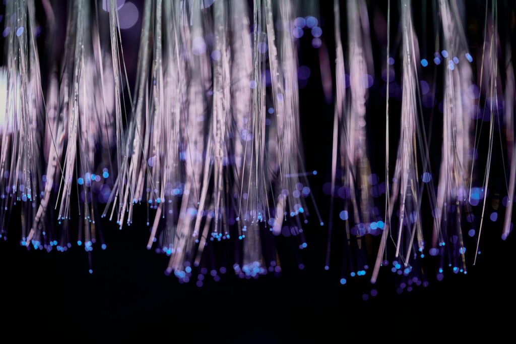 An abstract digital image showing interconnected nodes and data points, symbolizing the nature of a decentralized network.