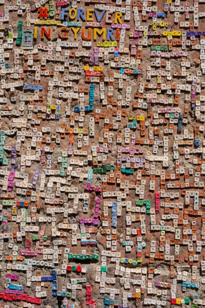 A futuristic cityscape infused with glowing crypto logos, illustrating the world of GameFi.