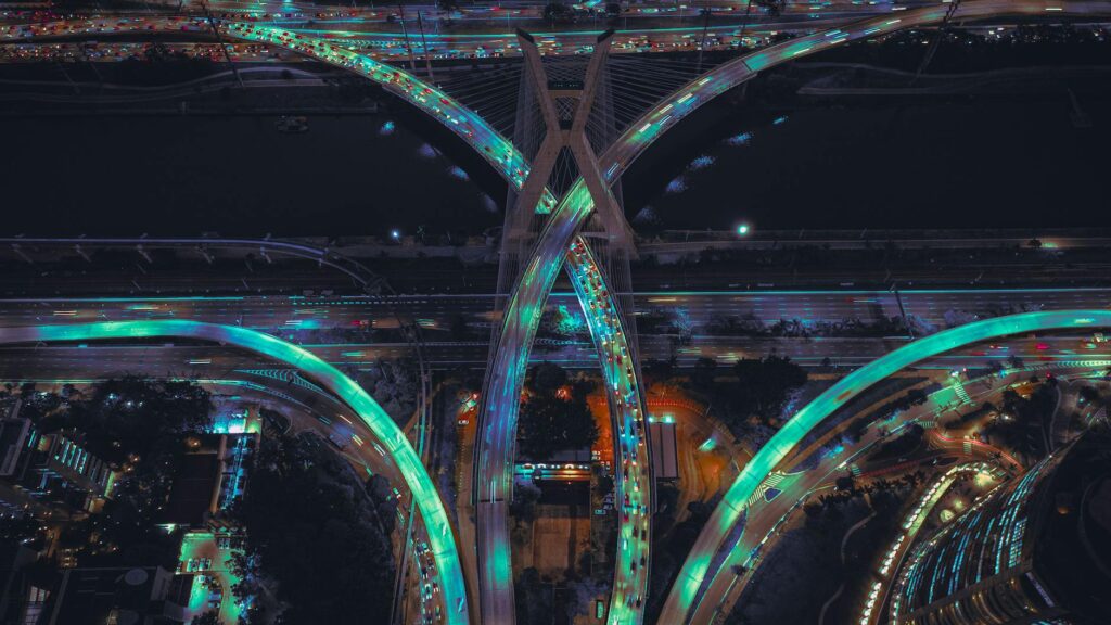 An abstract digital graphic of the globe with glowing lines connecting different continents, symbolizing a decentralized network.