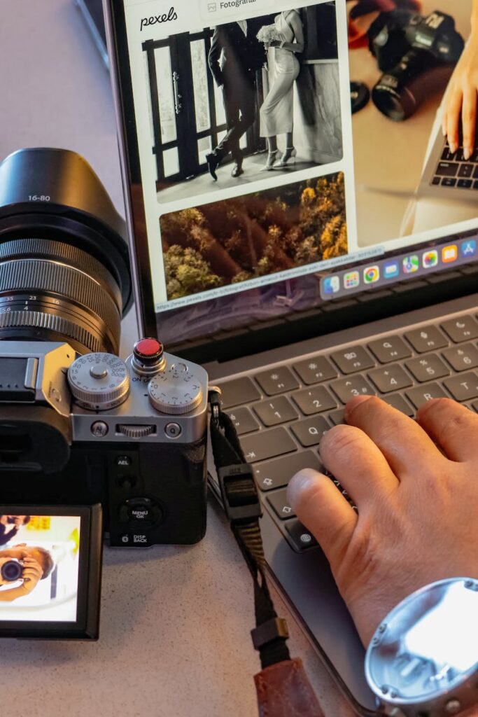 A gold physical Bitcoin placed on top of a green computer circuit board, symbolizing the merge of digital and physical.
