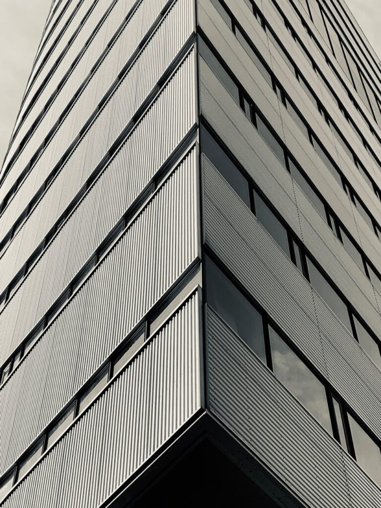 A close-up shot of a computer's circuit board with glowing blue and green lights, representing technology.
