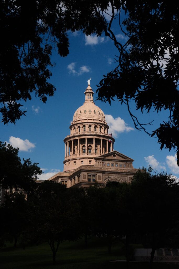 A powerful conceptual image of a single gold bitcoin shattering a thick, rusty chain, representing financial freedom and censorship resistance.