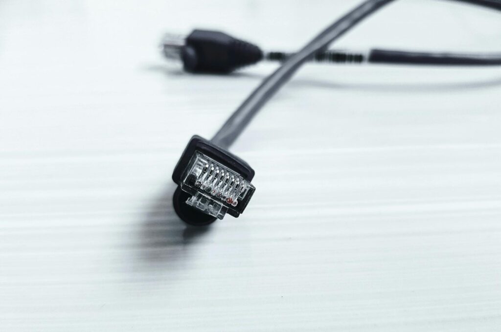 An abstract digital art piece showing a complex, interconnected web of glowing lines against a dark background, symbolizing blockchain state.