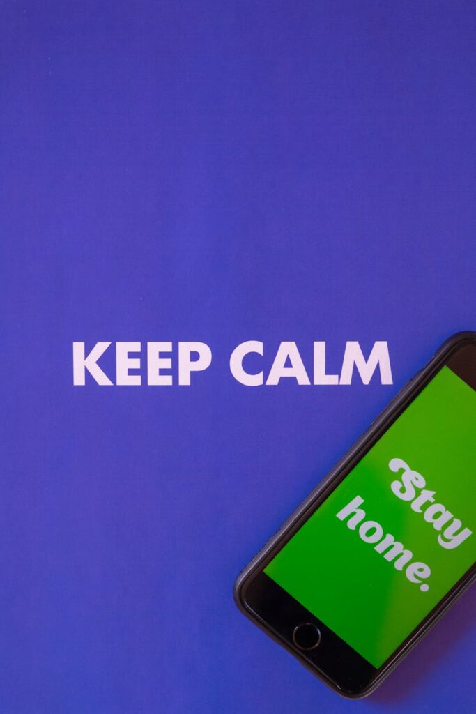 A close-up shot of a gold physical Bitcoin placed on a green computer motherboard.