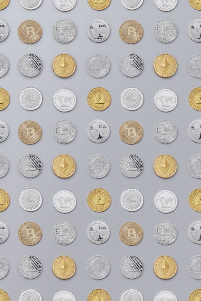 A close-up shot of a person's hands holding a smartphone displaying a cryptocurrency price chart.