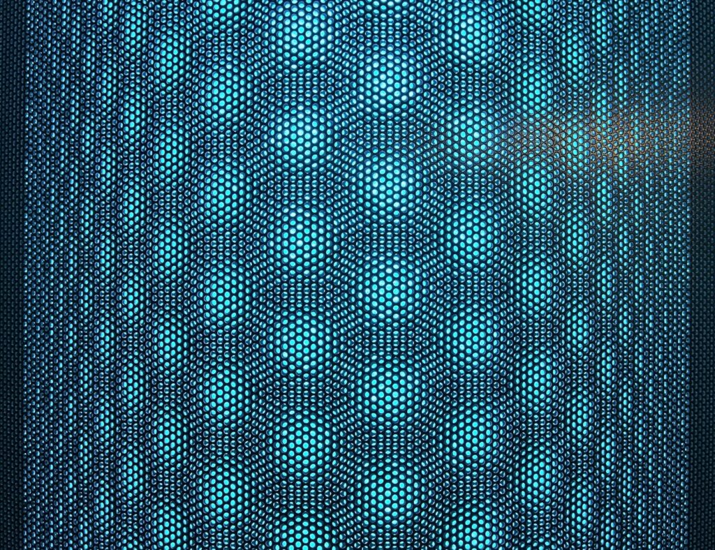 An investor analyzing a complex cryptocurrency price chart on a modern laptop screen in a dimly lit room.