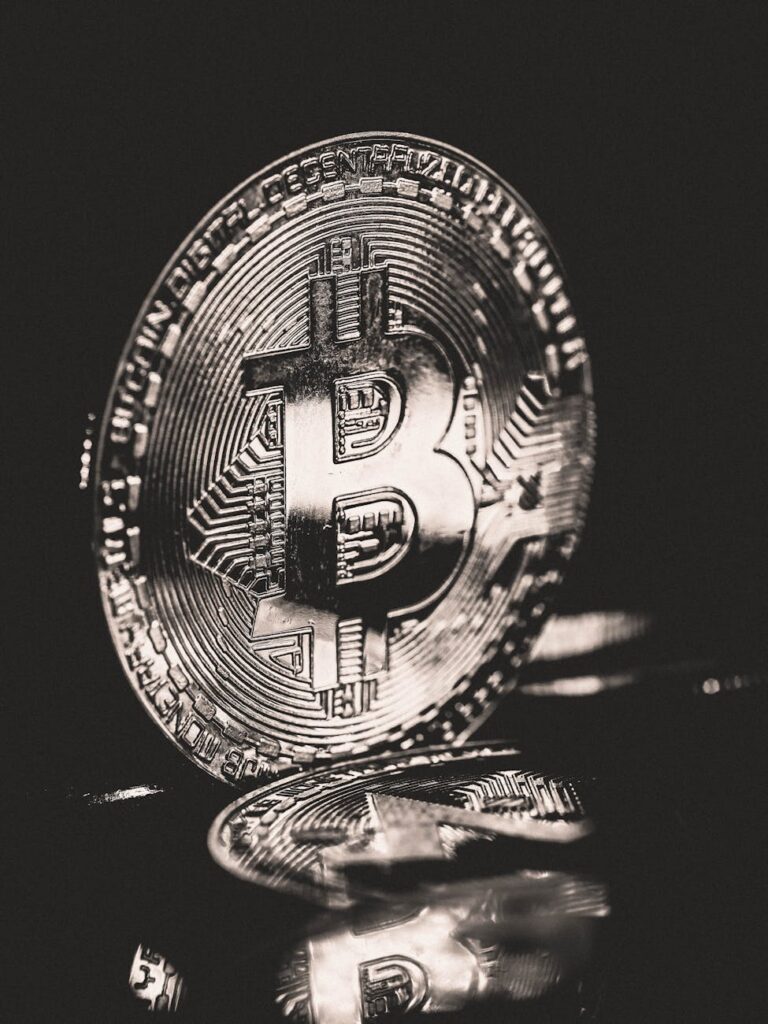 A neon blue icon symbolizing digital identity and reputation on a dark background.