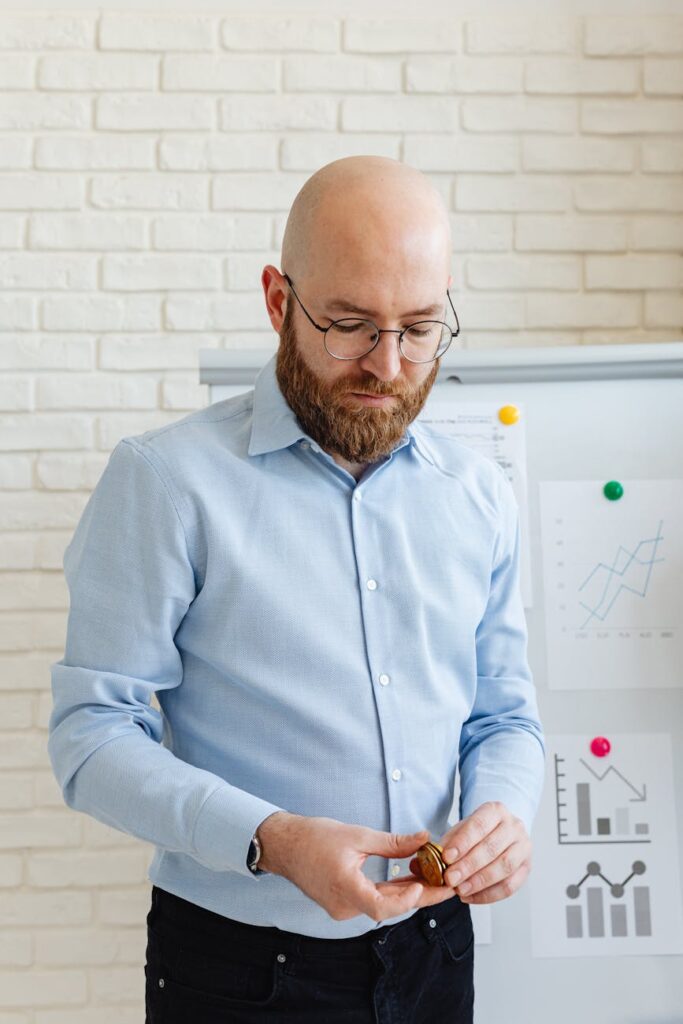A futuristic digital graphic showing a chain of glowing blue blocks, symbolizing blockchain technology.