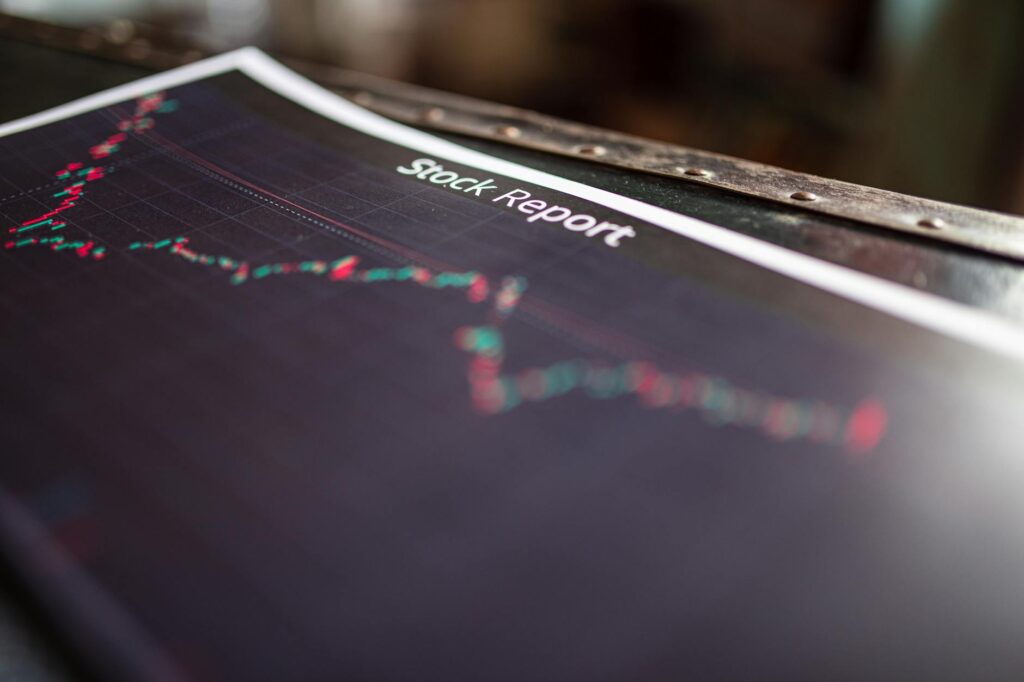 An illustration of the market mania phase with a rocket ship launching over a crypto chart.