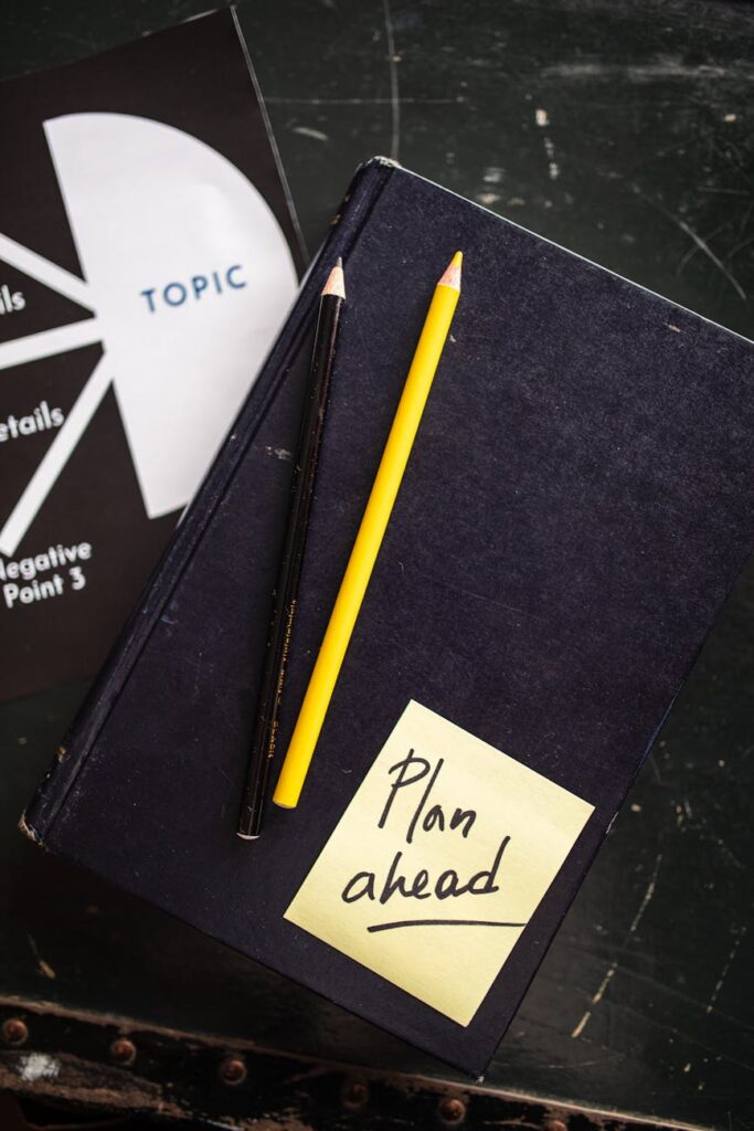 A complex project roadmap and strategy drawn out on a whiteboard, illustrating qualitative planning.