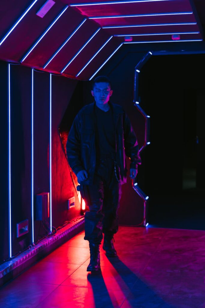 A financial analyst intently studying cryptocurrency price charts on a multi-monitor setup in a dimly lit office.