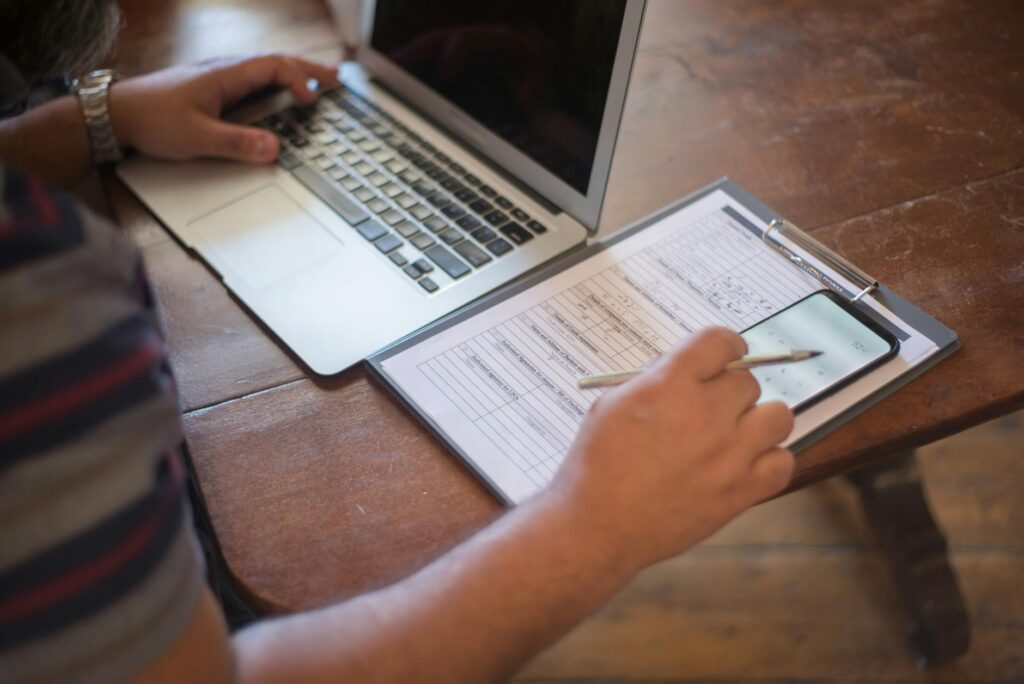 A detailed macro shot of physical Bitcoin and Ethereum coins on a computer motherboard.