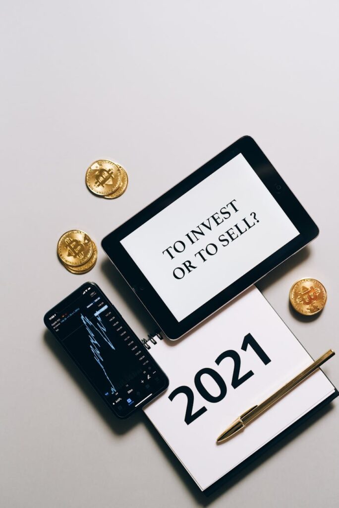 A close-up of a person's hand holding a smartphone displaying a crypto wallet interface, signifying the economy of a network state.