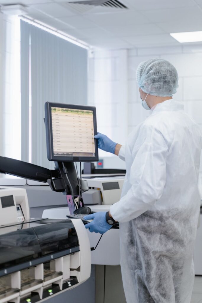 A user looking stressed while trying to manage multiple cryptocurrency platforms on different screens.